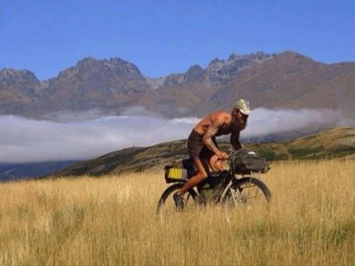 35-year-old American who thinks modern life is too stressful works 6 months a year, then lives on $10 a day adventuring around the world on a bicycle