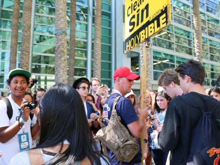 Teenagers are harassing the street preachers outside YouTube's convention