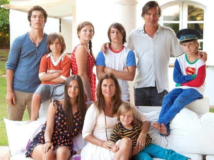 Meet the family with 7 kids that travels the country flipping houses, condos, and castles