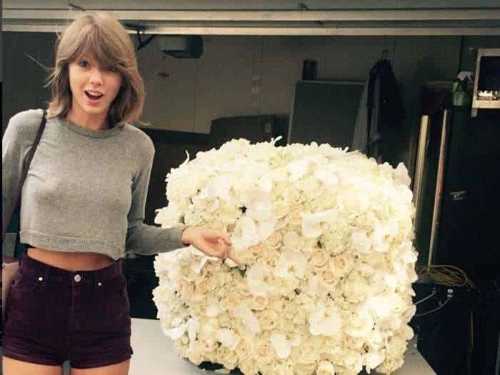 Kanye West sends Taylor Swift a massive block of white roses to seal their friendship after the VMAs