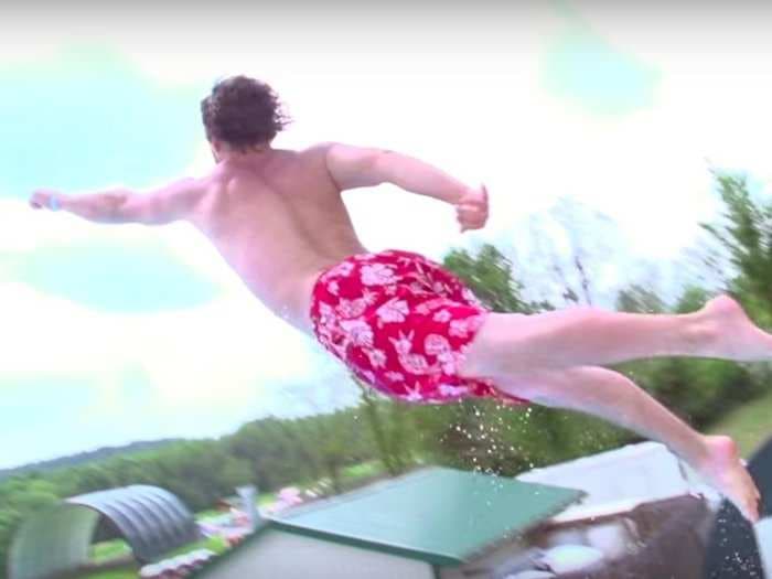 I can't stop watching people fly off these insane slip 'n slide launch ramps