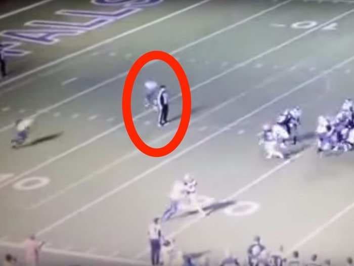 High school coach put on administrative leave after 2 players were suspended for blindsiding a ref during a game