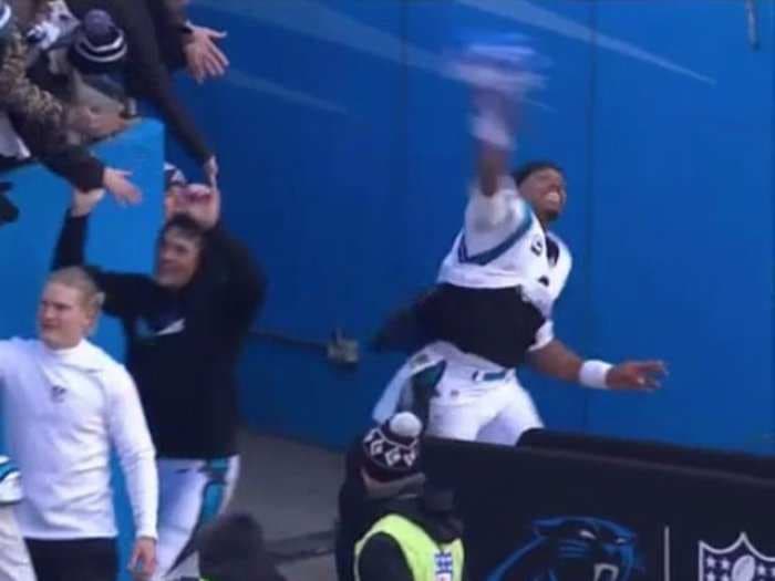 Cam Newton took a Seahawks flag and chucked it after huge playoff win