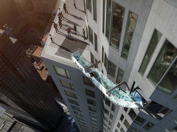 This glass slide will wrap around the top of a skyscraper 1,000 feet above downtown Los Angeles