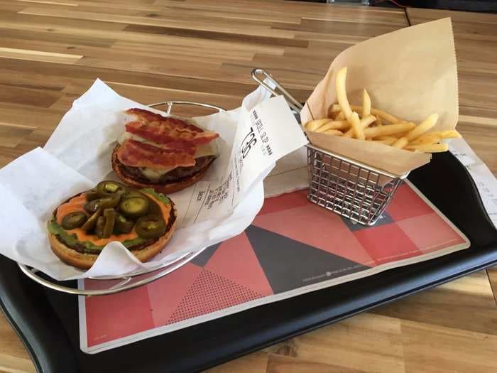  I stood in line to order a custom burger from a futuristic McDonald's kiosk - and now I get why the company is betting on them 