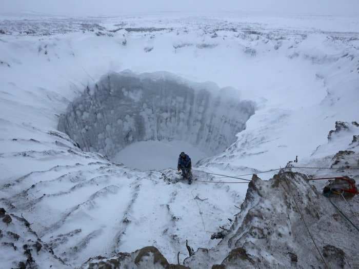 Giant holes found in Siberia could be signs of a ticking climate 'time bomb'