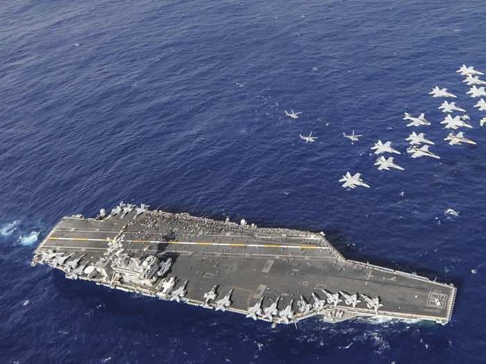 21 photos that show just how imposing US aircraft carriers are