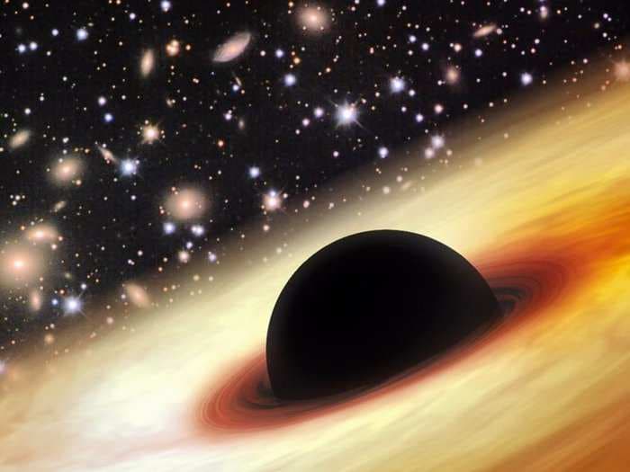 A three-way collision of galaxies has given birth to a monstrous black hole