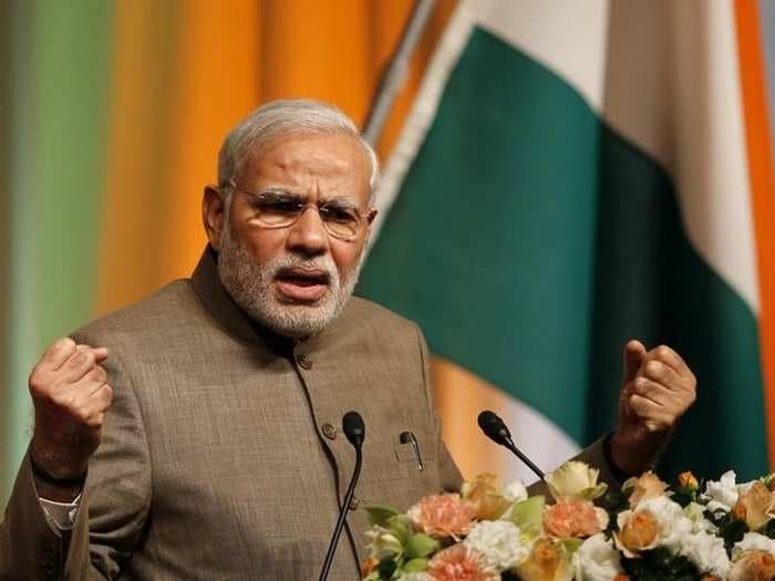 Modi softens tax blow on black money scheme by 14%