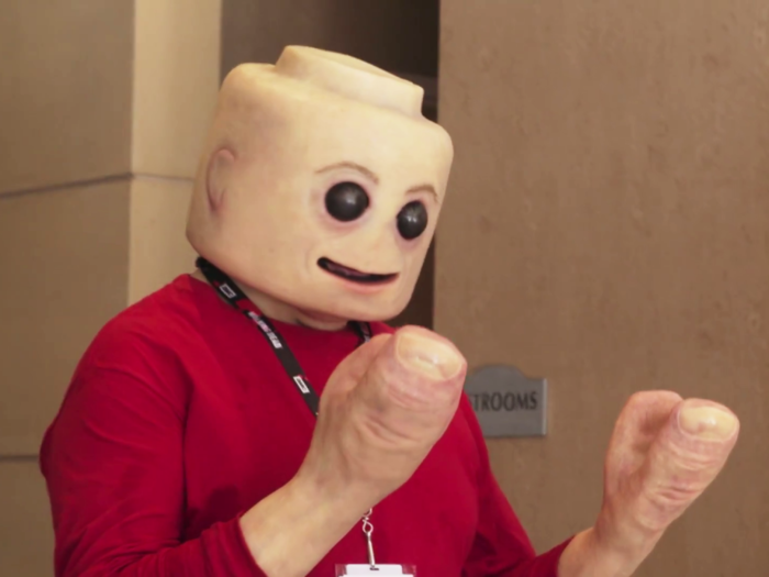 An artist made a realistic Lego minifigure costume that's super creepy