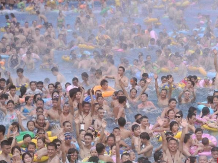 Thousands of people crammed into one pool to escape a heatwave in China