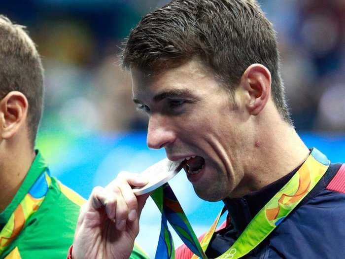 Here's why Olympic athletes bite their medals