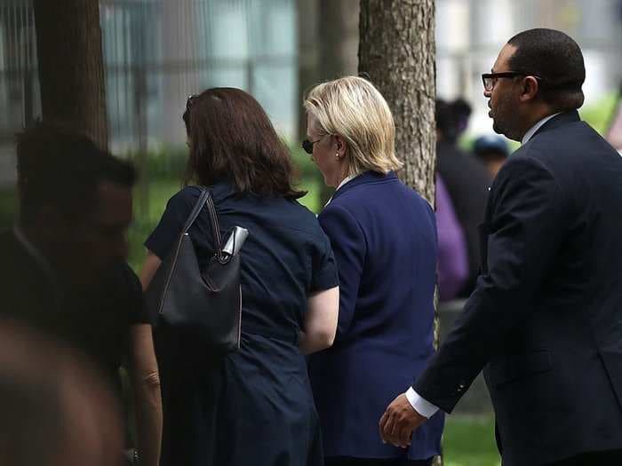 Hillary Clinton abruptly leaves 9/11 memorial after becoming 'overheated'
