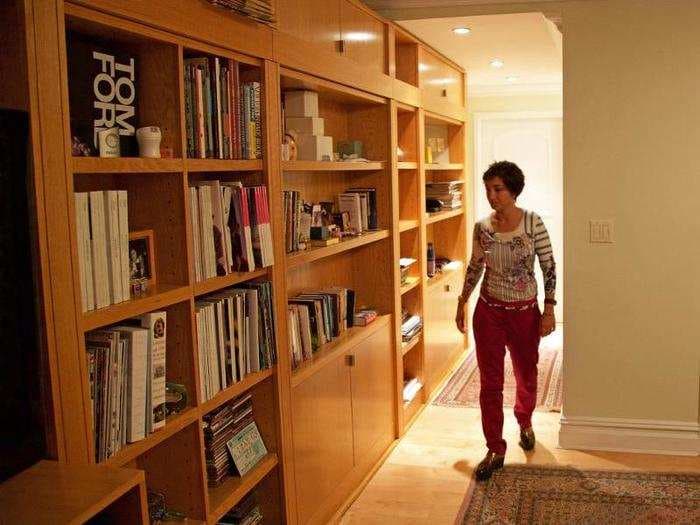 A woman spent $25,000 to build a room hidden behind a bookcase in her apartment - here's what it's like inside