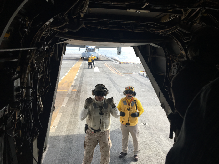 Here's why there are so many colored shirts on a aircraft carrier's flight deck