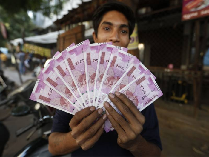 Nepal bans use of new Indian Rs 500 and Rs 2000 notes, calls them illegal