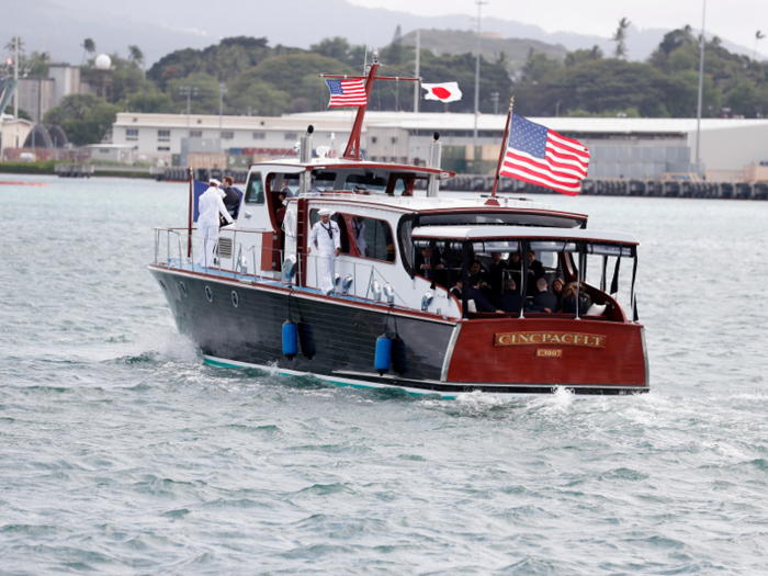 'We must never repeat the horrors of war again': Japan's prime minister and Obama visit Pearl Harbor