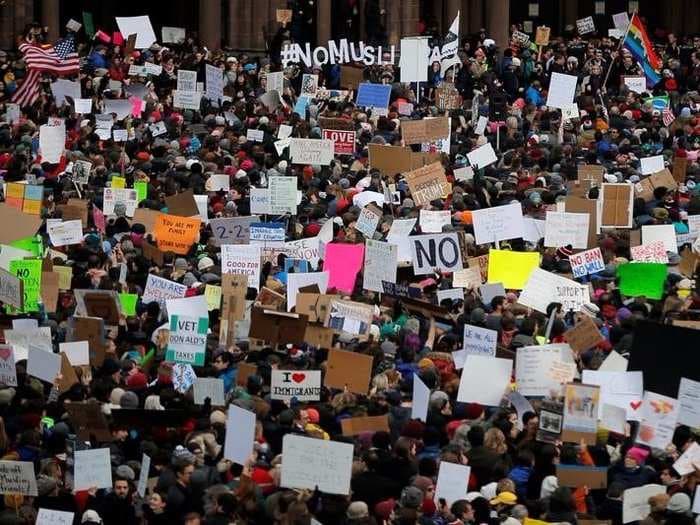 Tens of thousands protest Trump's immigration ban in cities and airports across the country