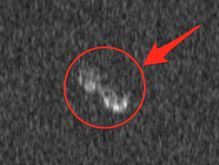 Astronomers have filmed a giant peanut-shaped asteroid flying through space - but one day it just might strike Earth