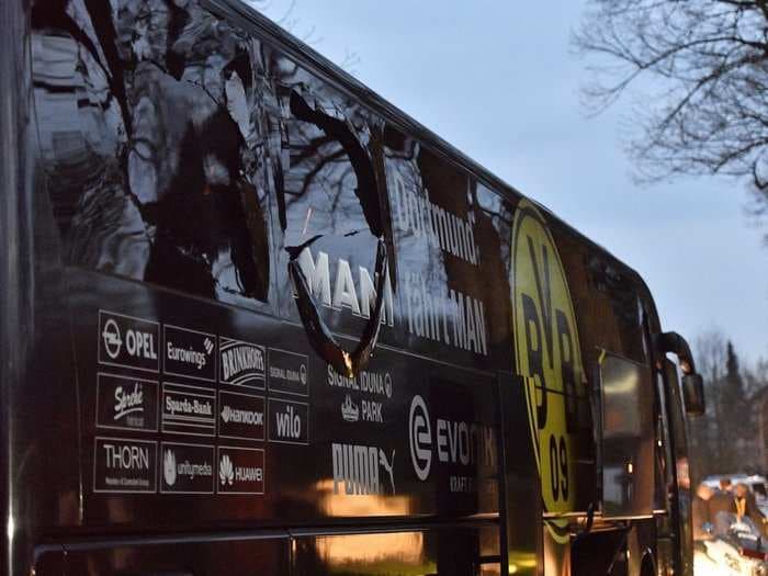 German soccer club's bus hit by 'an explosion' prior to Champions League match with one player injured