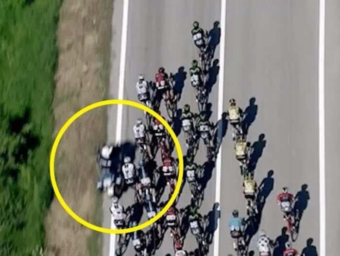 Chaos at Giro d'Italia - police motorcycle parked on racecourse wreaks havoc on peloton