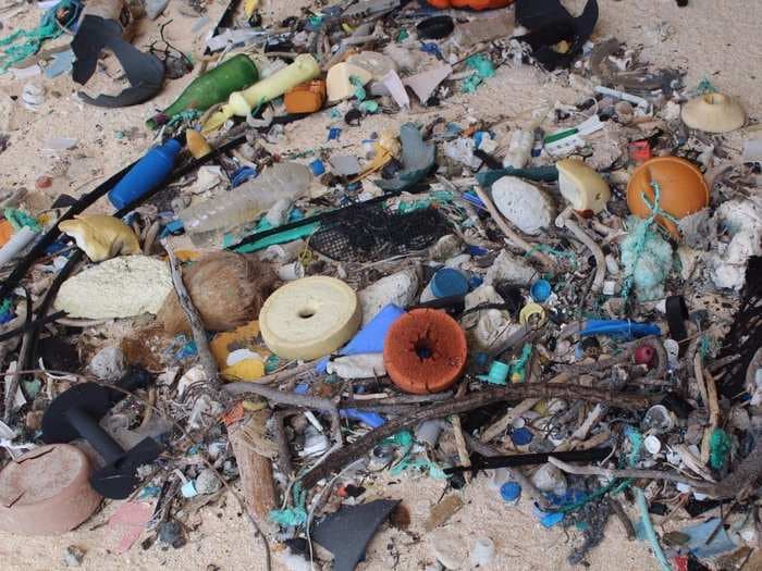 Alarming photos of the uninhabited island that's home to 37 million pieces of trash