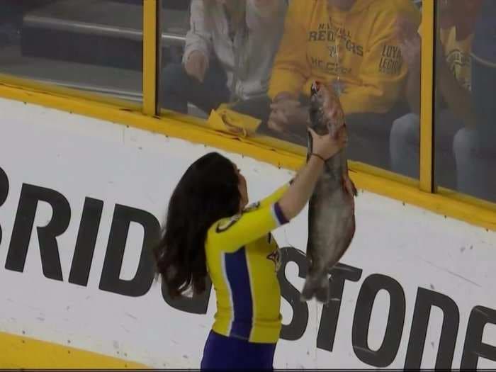 A Titans lineman participated in one of the NHL's strangest traditions - he threw a gigantic catfish on the ice