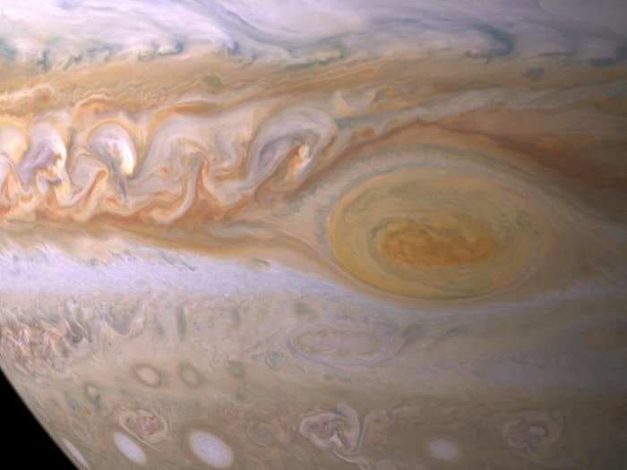 NASA will soon take the closest-ever photos of Jupiter's Great Red Spot - a storm the size of 2 Earths