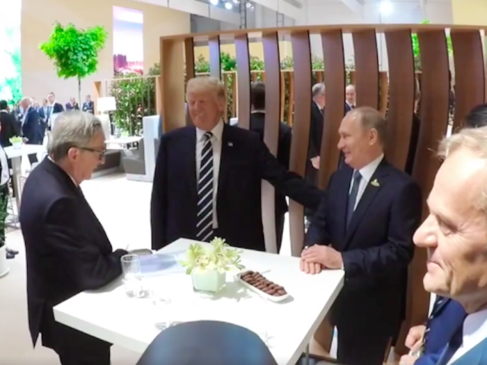 Here are the first images of Trump and Putin meeting