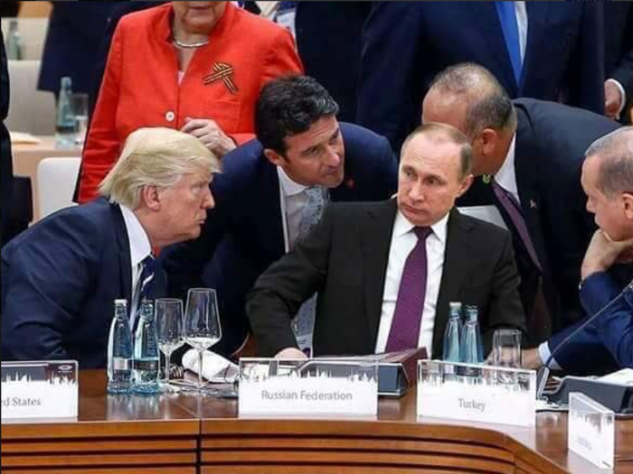 A photo of Trump and other leaders staring at Putin is going viral - but it's fake