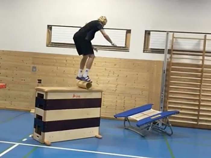 19-year-old Olympic skier's mind-boggling training exercise includes balancing, sliding, and flipping through an insane obstacle course