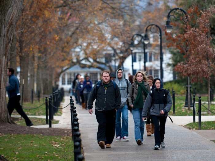 A Penn State fraternity has been suspended after a student was found unconscious in a parking lot nearby