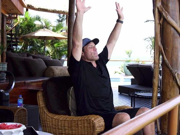 Tony Robbins starts every morning with an 'adrenal support cocktail,' a 'priming' meditation exercise, and a workout involving a 'torture machine'
