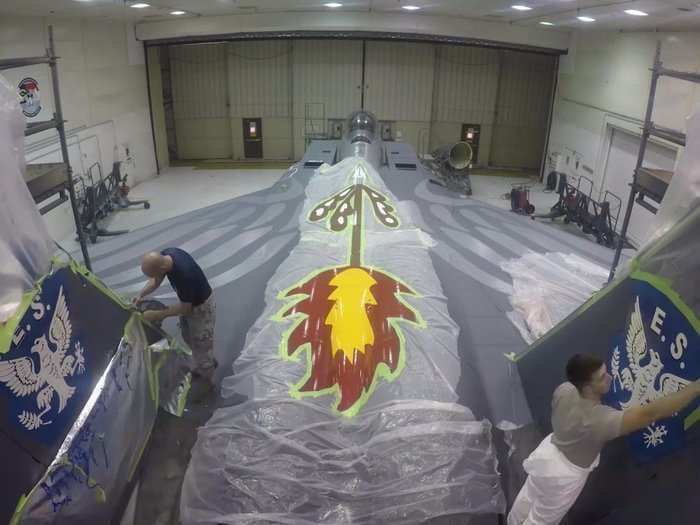 Watch this F-15E Strike Eagle receive a special paint job in this incredible time-lapse