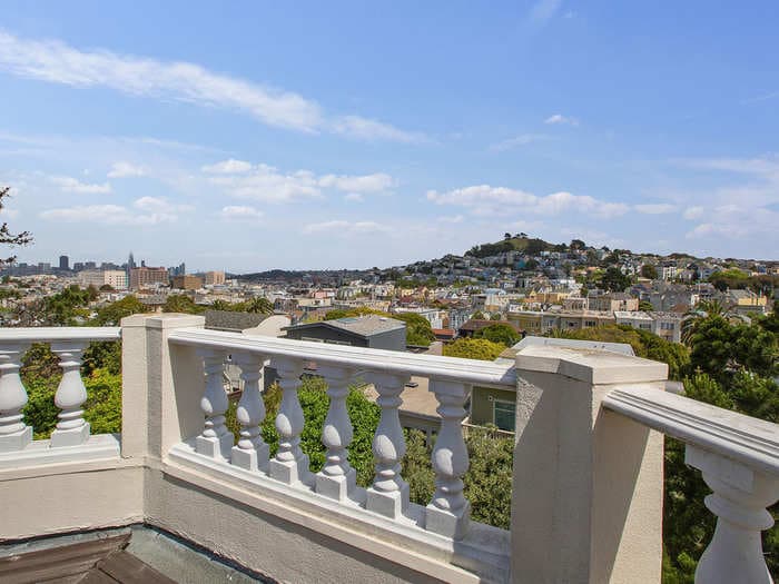 There's a hidden mansion for sale in San Francisco with a retractable glass roof, an indoor swimming pool, and a decoy house in front - take a look inside