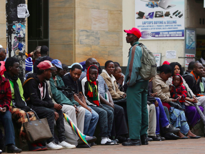 Tanks in the streets and long lines to withdraw money - here's what Zimbabwe looks like under military control