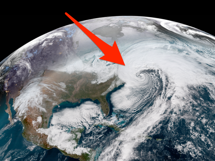 Stunning photos from space show the 'bomb cyclone' snowstorm blasting the US East Coast