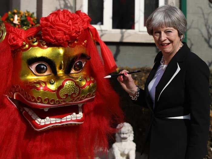 Chinese state media praises 'pragmatic' Theresa May for not mentioning their atrocious human rights while visiting them