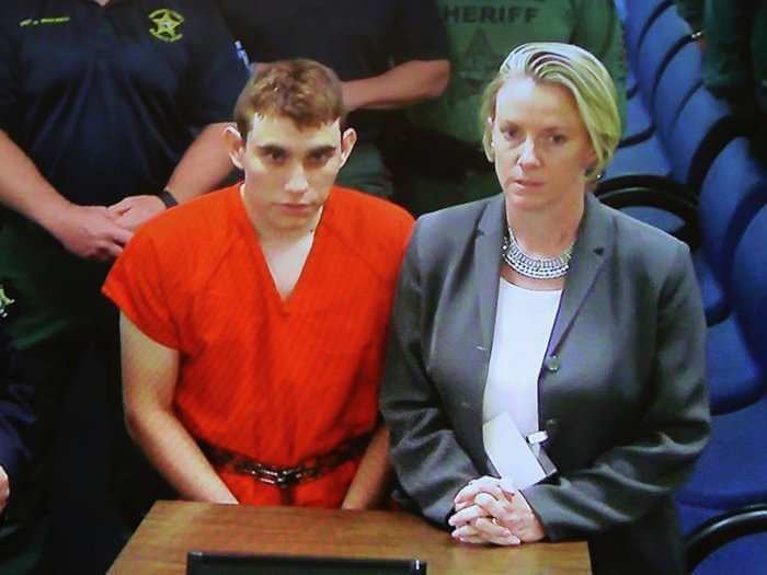 The Florida shooting suspect's mother reportedly told police he had been cutting himself and 'threatening her'