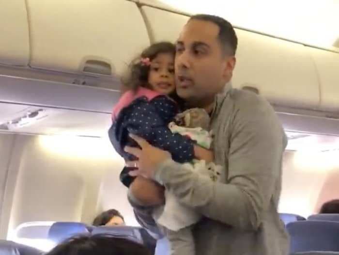 Southwest faces outrage after a father and toddler were kicked off a flight for the child throwing a tantrum