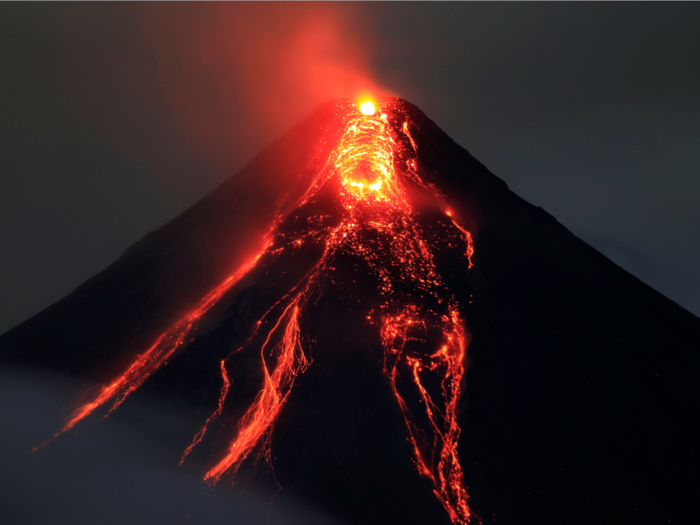 Geologists take burning-hot lava samples from active volcanoes - here's how they do it without getting hurt