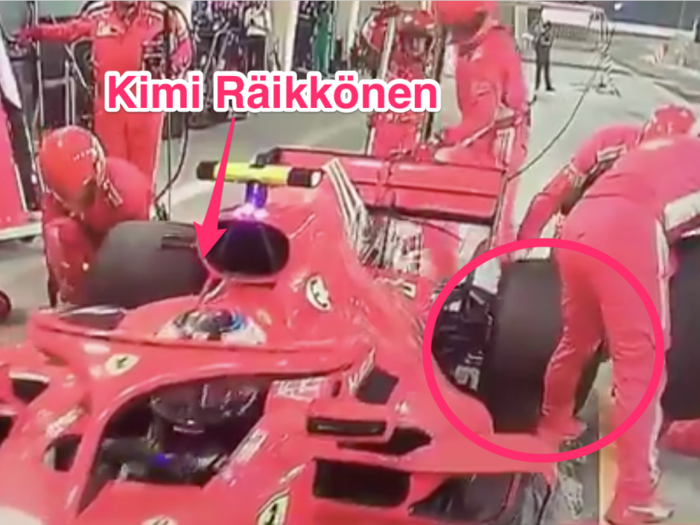 A Formula 1 racer broke a Ferrari mechanic's leg when he ran over him during the Bahrain GP
