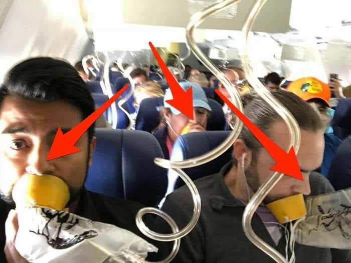 'Almost everyone' in a photo of Southwest's emergency landing wore their oxygen masks 'wrong,' says a former flight attendant