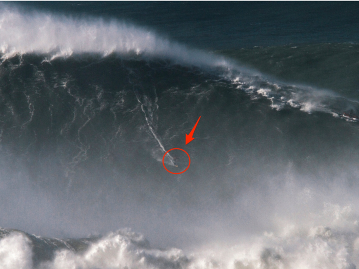 A surfer just set a world record for the largest wave ever ridden - watch him surf the 80-foot-tall behemoth