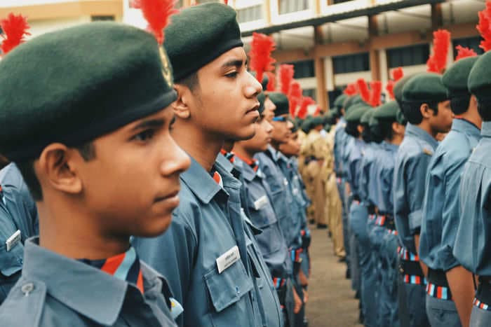 In India, students are being directed to respond to school roll calls with patriotic salutations