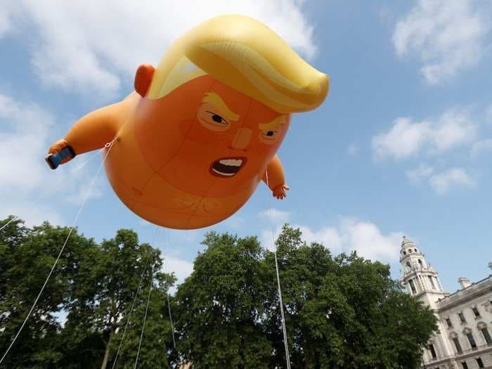 The giant angry orange baby balloon that Trump says made him 'feel unwelcome' is floating over London right now - here's what it looks like