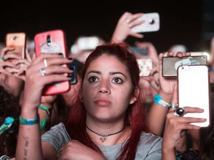 A professor in Ohio takes attendance on Twitter, posts homework on Slack, and holds office hours at 10 p.m. - and it shows how different Gen Z really is