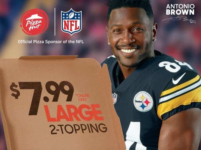 Pizza Hut is trying to cash in on NFL fans by taking the opposite approach of Papa John's and Nike