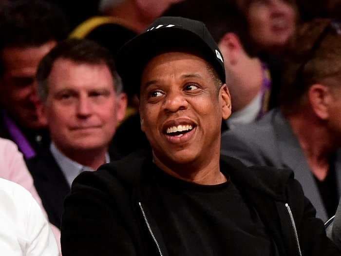 Jay-Z is worth $900 million - see how the rapper-turned-mogul makes and spends his fortune