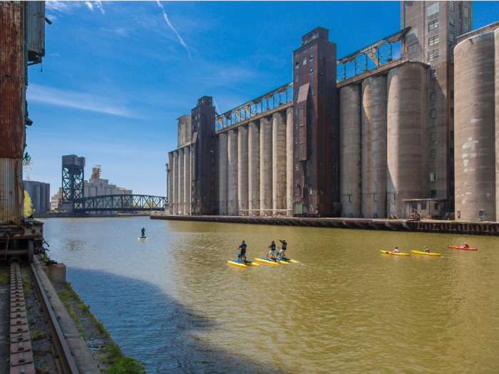 Before and after photos show how abandoned grain elevators are turning into luxury hotels, tiny homes, and museums